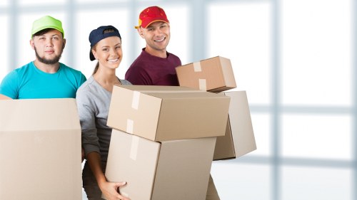 Local removals van loading furniture in Greenwich