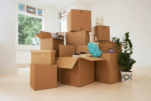 Household boxes and furniture loaded into a removal van