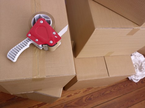 Unpacking boxes in a Greenwich apartment