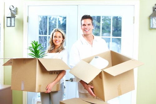 Professional man with a van in Greenwich handling household relocation items